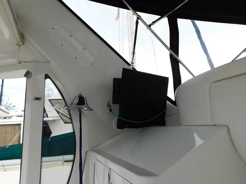 Slide: The Image of 2003 Carver 444 Cockpit Motor Yacht interior with bell and equipment. - 6