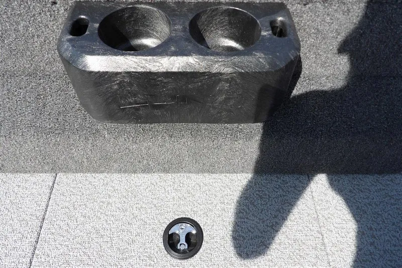 Slide: The Image of 2026 Lund 1875 Impact XS Sport boat cup holder and deck detail. - 21