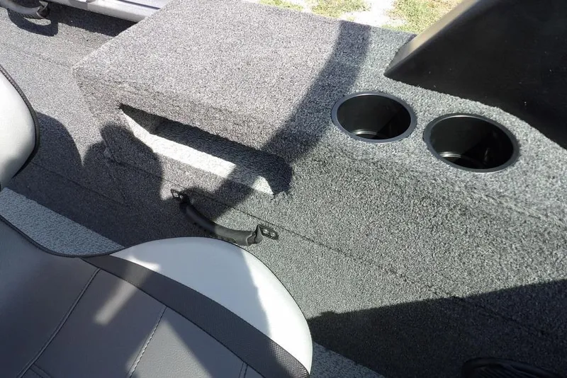 Slide: The Image of Interior of 2026 Lund 1875 Impact XS Sport boat with cup holders and seating. - 28