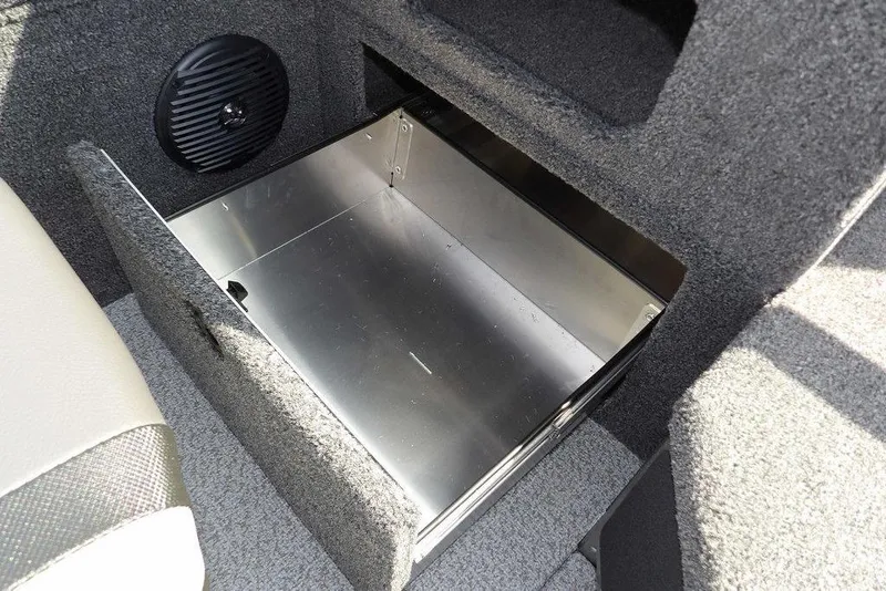 Slide: The Image of Open storage compartment in 2026 Lund 1875 Impact XS Sport boat interior. - 34