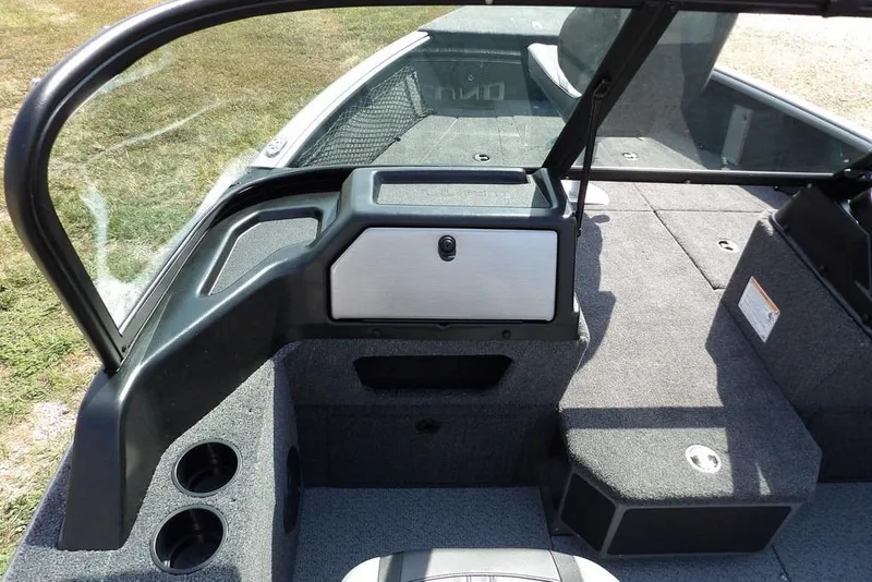 Slide: The Image of 2026 Lund 1875 Impact XS Sport boat interior with seating and storage compartments. - 35