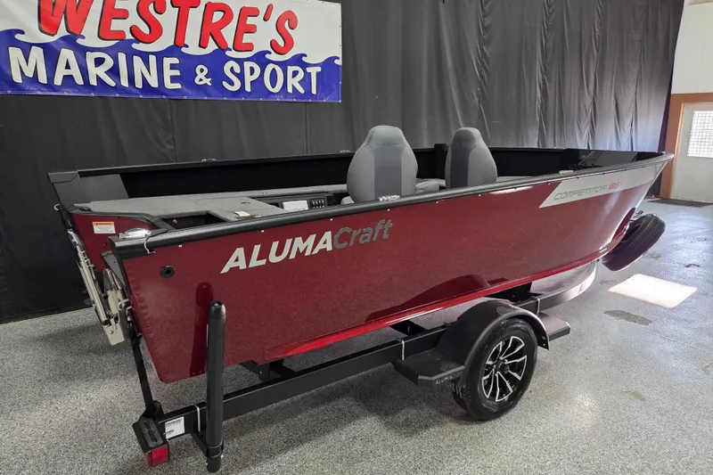 Slide: The Image of 2026 Alumacraft Competitor 185X Tiller boat displayed at Westre's Marine & Sport. - 2