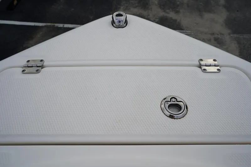 Slide: The Image of 2023 Robalo R222 Explorer boat deck with stainless steel fittings. - 29