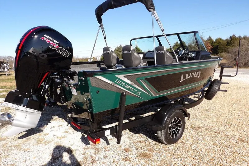 Slide: The Image of 2026 Lund 1875 Impact XS Sport boat with Mercury Pro XS engine on trailer. - 11