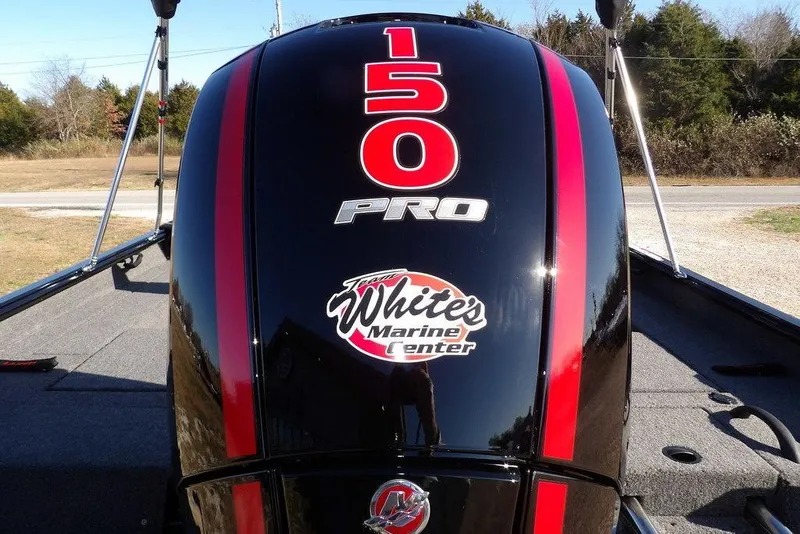 Slide: The Image of Outboard motor on 2026 Lund 1875 Impact XS Sport boat, featuring "150 Pro" and "White's Marine Center" logos. - 37