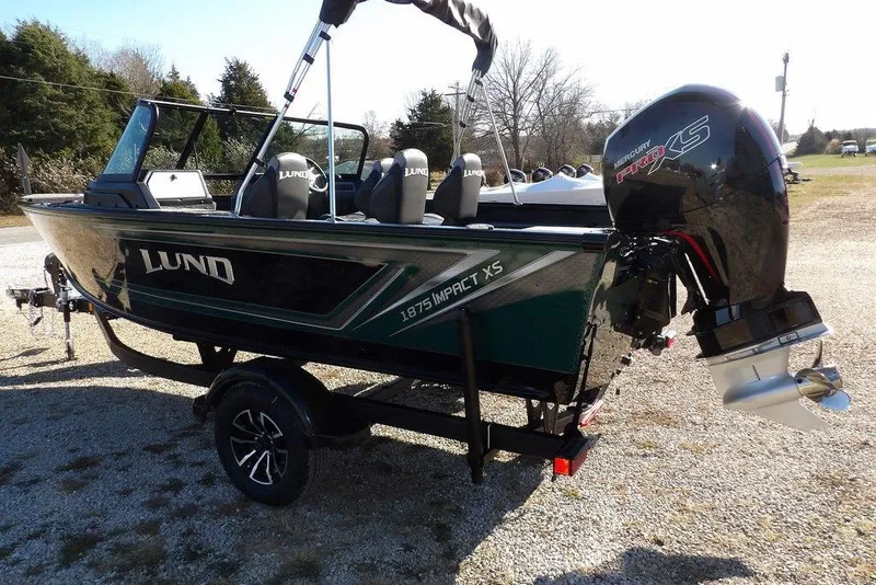 Slide: The Image of 2026 Lund 1875 Impact XS Sport boat with Mercury Pro XS engine on trailer. - 8