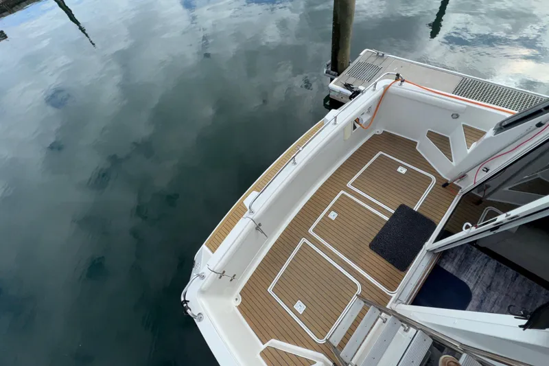 Slide: The Image of 1996 Carver 370 Voyager boat deck with water reflection. - 37