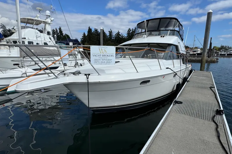 Slide: The Image of 1996 Carver 370 Voyager yacht docked at marina, offered by yacht brokers. - 45