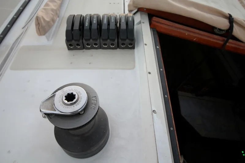 Slide: The Image of Deck of 1981 Ericson 36 sailboat with winch and rope clutches. - 16