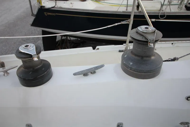 Slide: The Image of Deck of 1981 Ericson 36 sailboat with winches and cleats. - 19
