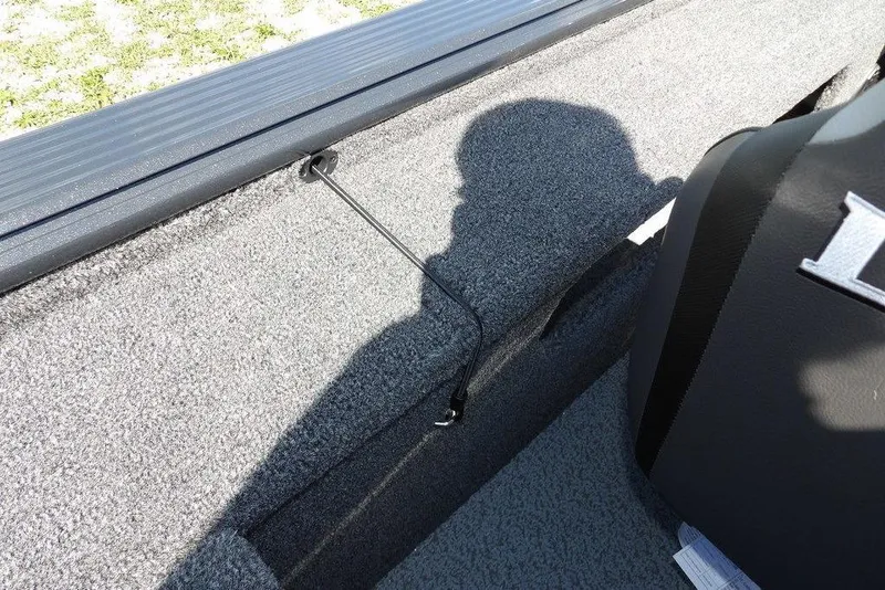 Slide: The Image of 2026 Lund 1875 Pro-V Bass XS interior with shadow and cable detail. - 23