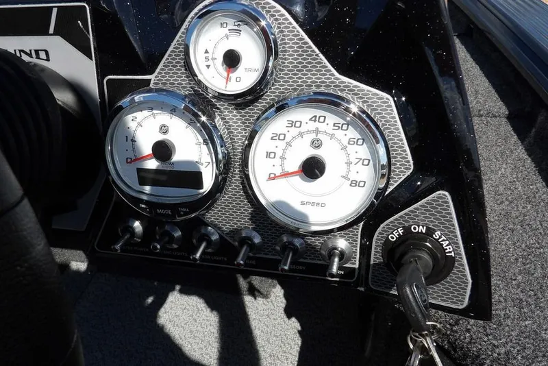 Slide: The Image of Dashboard of 2026 Lund 1875 Pro-V Bass XS with gauges and ignition key. - 28