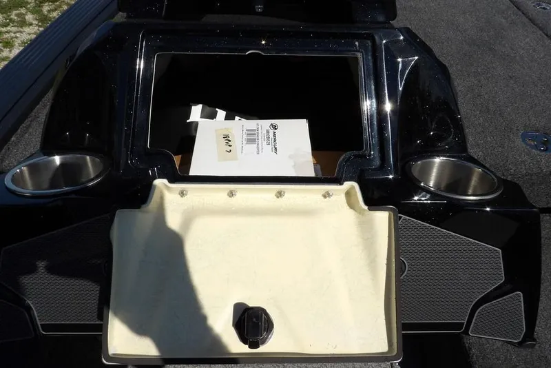 Slide: The Image of Open storage compartment on 2026 Lund 1875 Pro-V Bass XS boat. - 35