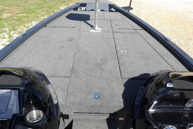 Slide: The Image of 2026 Lund 1875 Pro-V Bass XS boat deck with storage compartments. - 37