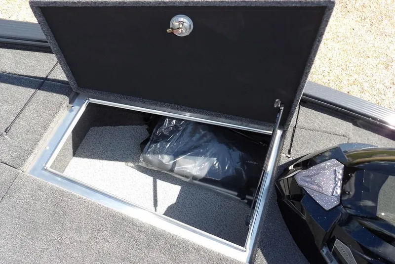 Slide: The Image of Open storage compartment in 2026 Lund 1875 Pro-V Bass XS boat. - 43