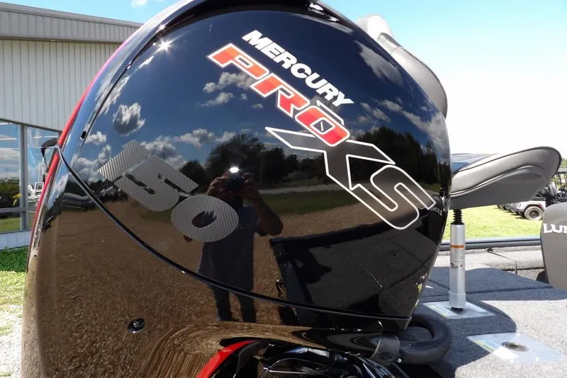 Slide: The Image of Mercury Pro XS engine on 2026 Lund 1875 Pro-V Bass XS boat, outdoor setting. - 54