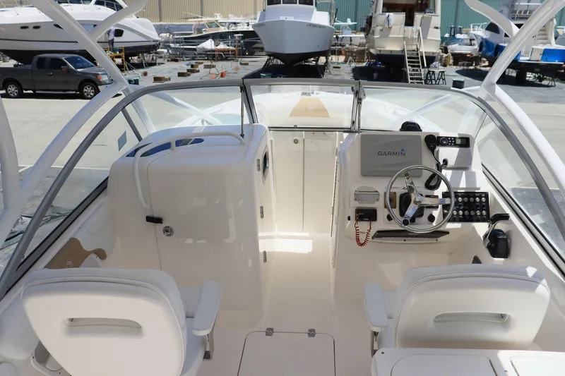Slide: The Image of Interior of a 2015 Everglades 245 CX boat with Garmin navigation system. - 10