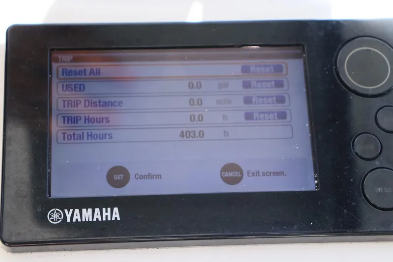 Slide: The Image of Yamaha display showing trip data on Everglades 245 CX, 2015 model, with 403 total hours. - 19