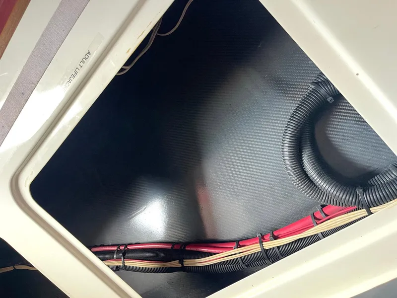 Slide: The Image of Interior view of 2008 Goetz Custom Boats 33' Limo Tender wiring compartment. - 14