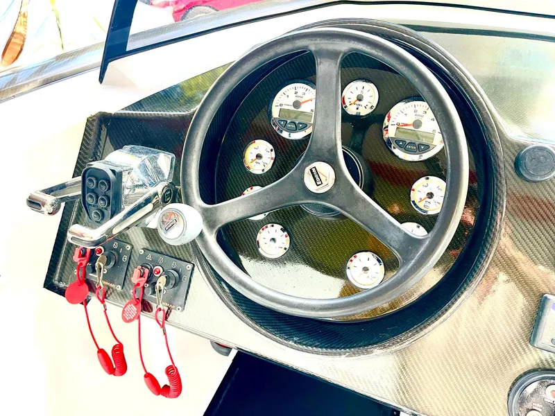 Slide: The Image of Steering wheel and dashboard of 2008 Goetz Custom Boats 33' Limo Tender. - 3