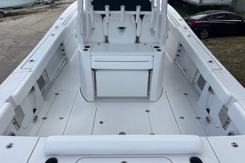 Slide: The Image of 2026 Sportsman Open 352 Center Console boat interior, featuring spacious seating and storage. - 10