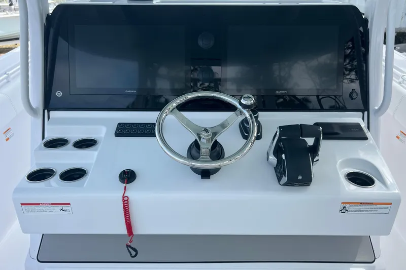 Slide: The Image of 2026 Sportsman Open 352 Center Console dashboard with steering wheel and controls. - 18