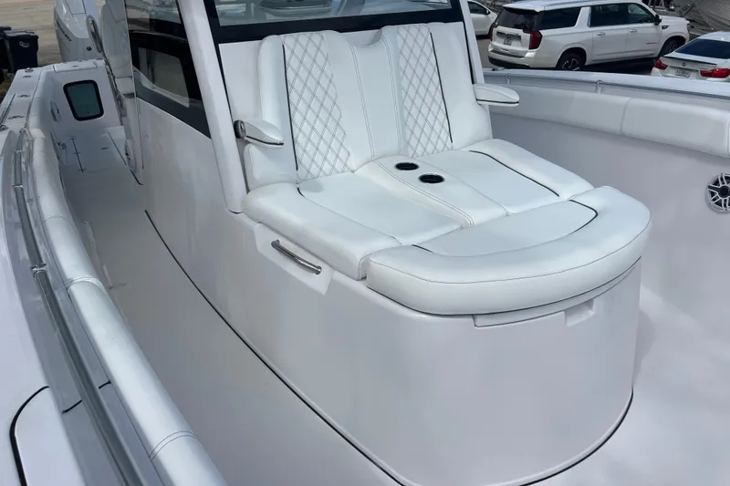 Slide: The Image of 2026 Sportsman Open 352 Center Console with luxurious white seating. - 23