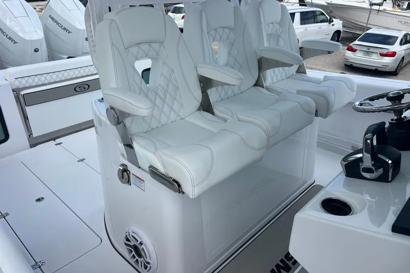 Slide: The Image of 2026 Sportsman Open 352 Center Console with luxurious seating and modern controls. - 25