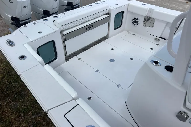 Slide: The Image of 2026 Sportsman Open 352 Center Console boat interior with spacious deck and seating. - 26