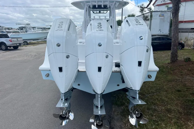 Slide: The Image of 2026 Sportsman Open 352 Center Console with triple 400 V10 engines, rear view. - 6