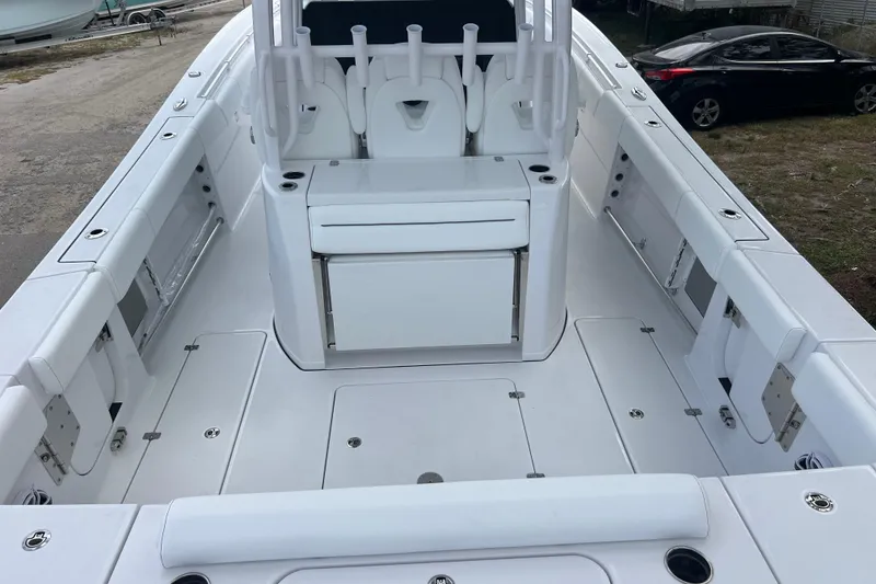 Slide: The Image of 2026 Sportsman Open 352 Center Console boat interior, featuring spacious seating and storage. - 9