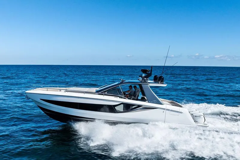 The Image of 2024 Azimut Verve 42 yacht cruising on open sea under clear blue sky. - 1