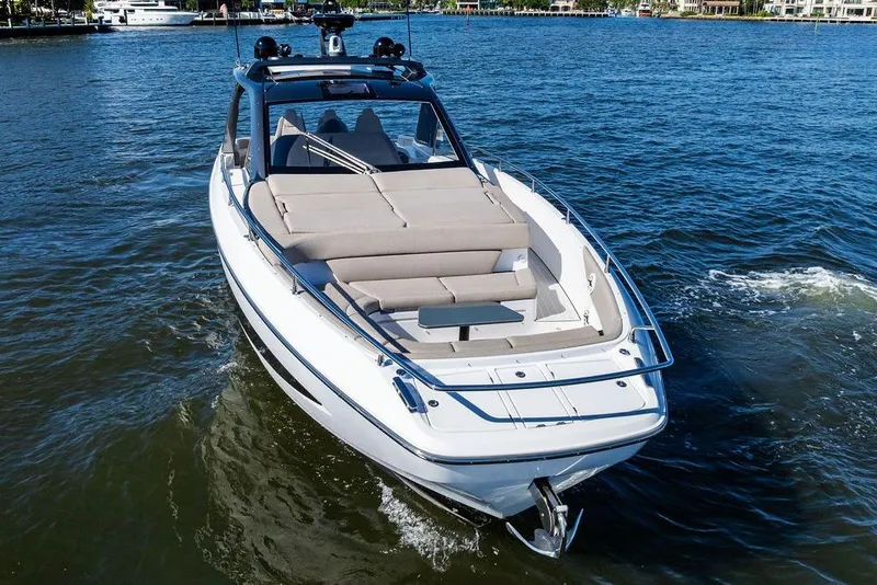 Slide: The Image of 2024 Azimut Verve 42 luxury yacht cruising on open water. - 14