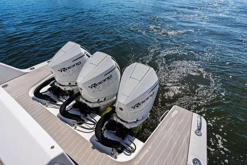 Slide: The Image of Triple outboard engines on 2024 Azimut Verve 42 yacht, cruising on open water. - 20