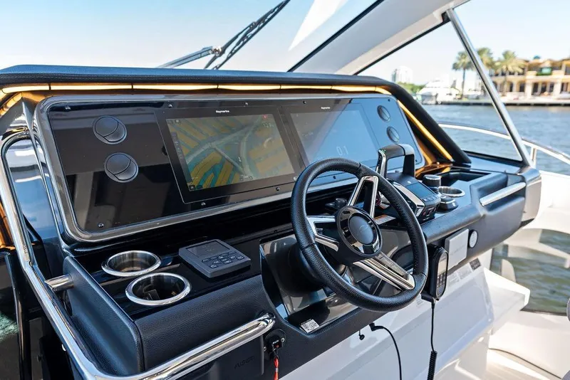 Slide: The Image of Helm of 2024 Azimut Verve 42 yacht with modern navigation system and controls. - 30