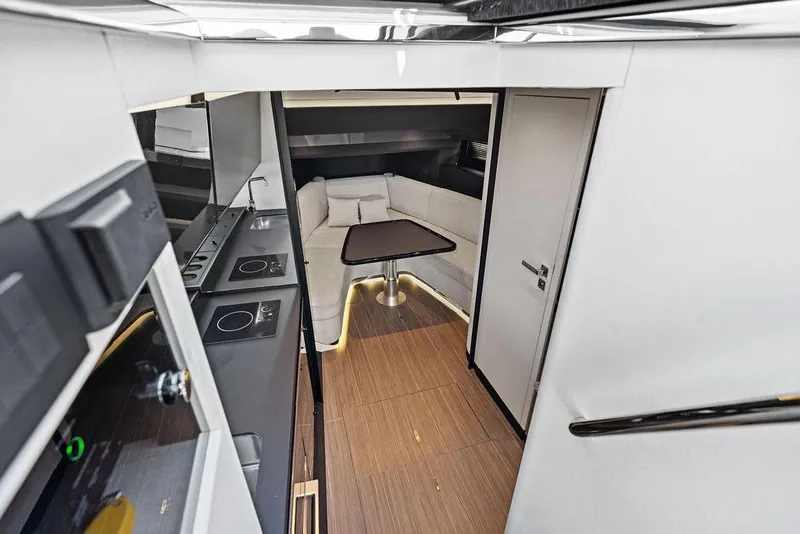 Slide: The Image of Luxurious interior of 2024 Azimut Verve 42 yacht with modern kitchen and seating area. - 37