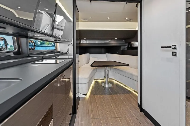Slide: The Image of Luxurious interior of 2024 Azimut Verve 42 yacht with modern kitchen and cozy seating area. - 38
