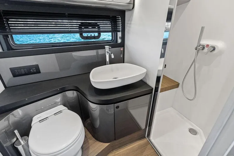 Slide: The Image of Luxurious bathroom in 2024 Azimut Verve 42 yacht with modern fixtures and ocean view. - 40