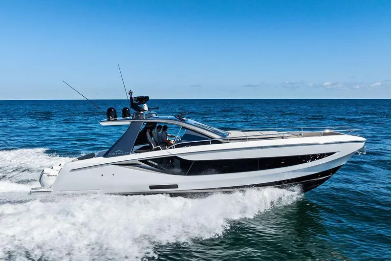 Slide: The Image of 2024 Azimut Verve 42 yacht cruising on open sea under clear blue sky. - 7