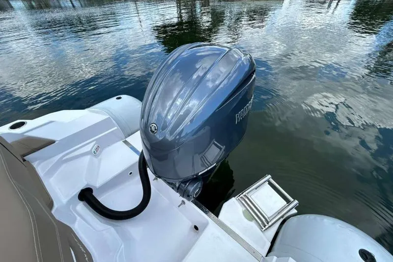 Slide: The Image of 2026 Ranieri CAYMAN 23 Sport boat with Yamaha outboard motor on calm water. - 20