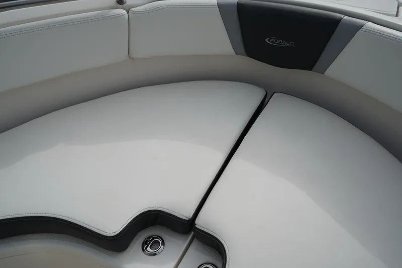 Slide: The Image of 2023 Robalo R222 Center Console boat seating area, white upholstery. - 23