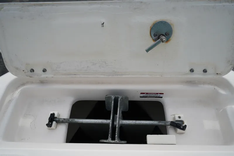 Slide: The Image of Anchor storage compartment on 2023 Robalo R222 Center Console boat. - 29