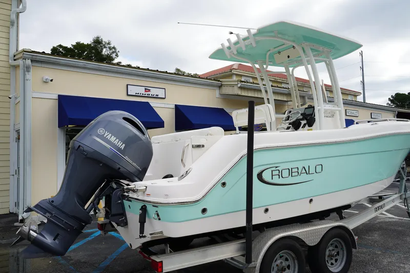 Slide: The Image of 2023 Robalo R222 Center Console boat with Yamaha engine on trailer. - 3