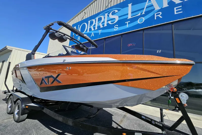 Slide: The Image of 2026 ATX Surf Boats 22 Type-S in orange, displayed at Norris Lake Boat Store. - 26
