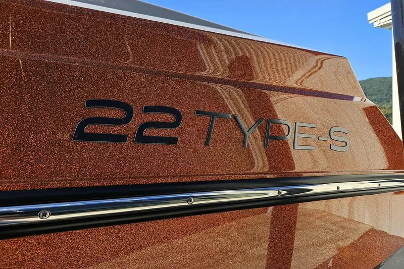 Slide: The Image of 2026 ATX Surf Boats 22 Type-S, close-up of model name on metallic finish. - 3