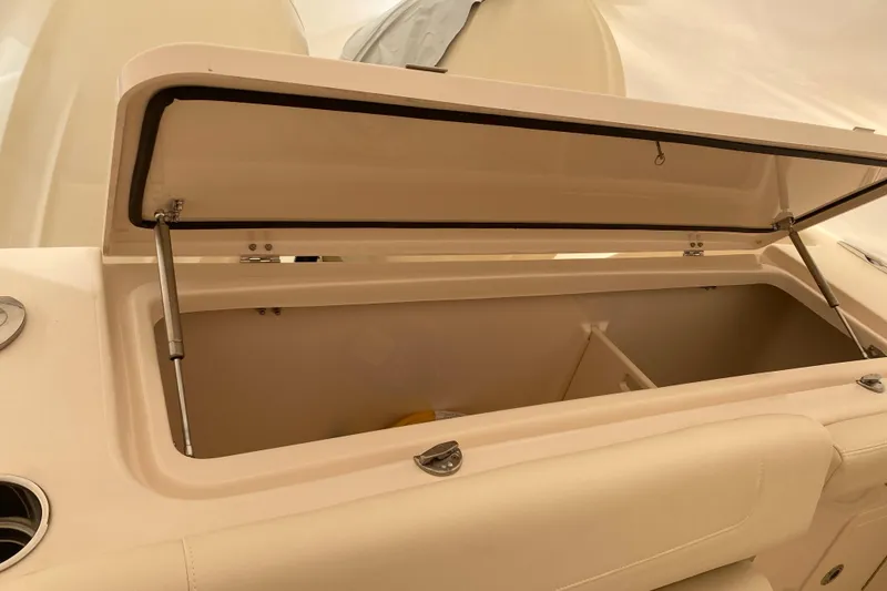 Slide: The Image of Open storage compartment on 2026 Grady-White Canyon 306 boat. - 16