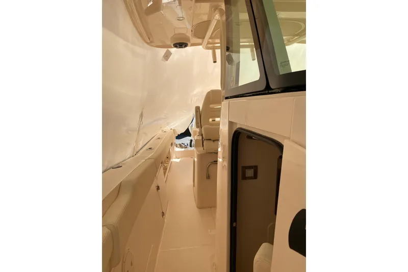 Slide: The Image of 2026 Grady-White Canyon 306 boat interior, featuring sleek design and comfortable seating. - 7
