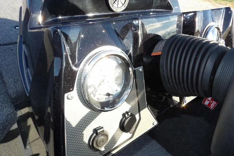 Slide: The Image of Dashboard of 2026 Lund 1875 Renegade boat with fuel gauge and controls. - 26