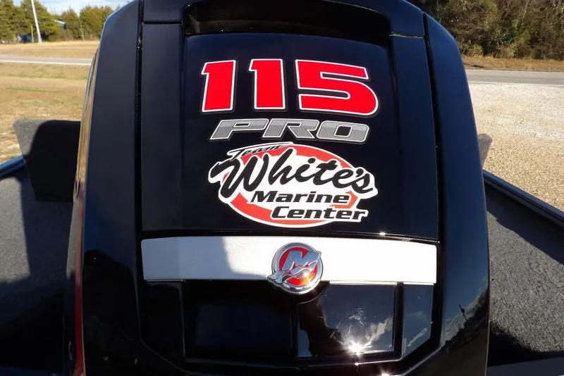 Slide: The Image of Outboard motor on 2026 Lund 1875 Renegade, featuring "115 Pro" and "White's Marine Center" branding. - 37