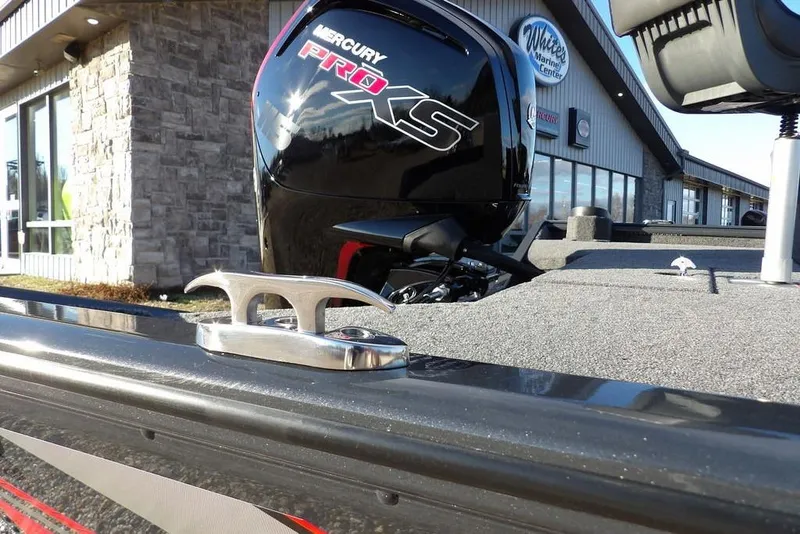 Slide: The Image of 2026 Lund 1875 Renegade boat with Mercury Pro XS engine at marine center. - 43